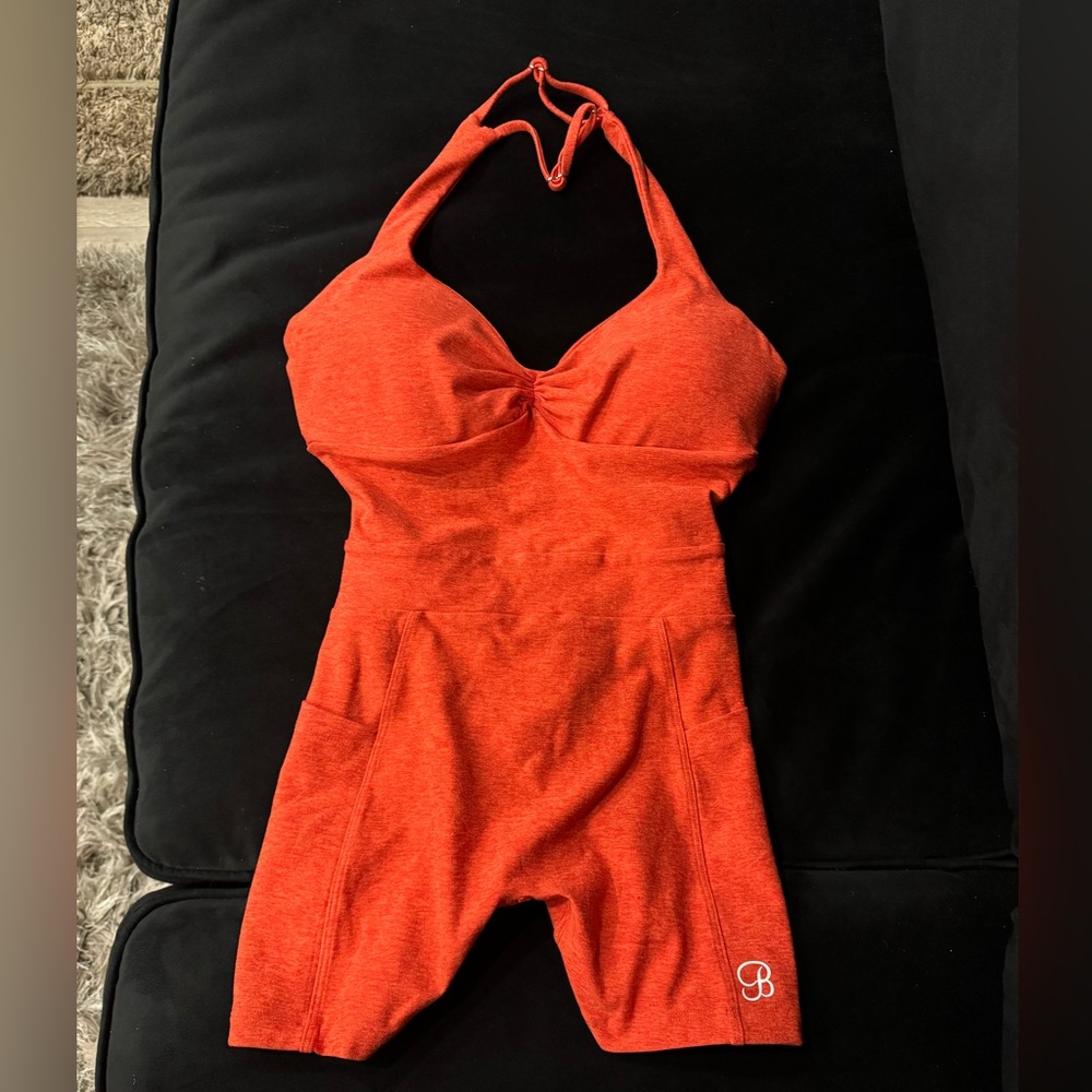 Bombshell sportswear Medium Apricot Backless pocket Bodysuit Short.
